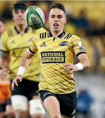  ?? GETTY IMAGES ?? Fletcher Smith, seen here in action for the Hurricanes last season, has inherited Beauden Barrett’s No 10 jersey for the team’s Super Rugby season opener.