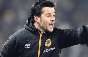  ?? AP ?? Hull City manager Marco Silva gestures during the English League Cup semi-final second-leg match between Hull City and Manchester United at KCOM Stadium in Hull, England, on Thursday January 26.
