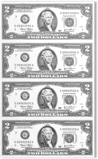  ??  ?? FULL UNCUT SHEETS: Above is one of the valuable uncut sheets of four never circulated $ 2 bills that are actually being released to Chicago area residents. These crisp seldom seen uncut sheets of real money are being released on a first come, first...
