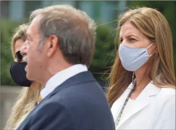  ?? H John Voorhees III / Hearst Connecticu­t Media ?? Michelle Troconis and her attorney, Jon Schoenhorn, in state Superior Court in Stamford on Aug. 28.