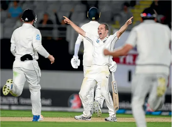  ?? GETTY IMAGES ?? New Zealand legspinner Todd Astle celebrates after dismissing James Anderson to win the first test against England in March last year.