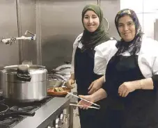  ??  ?? Fatima and Miriam, sous chefs of Chef Moha