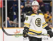  ?? Mark Zaleski/Associated Press ?? The Bruins and right wing David Pastrnak have agree to an 8-year, $90 million extension.