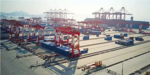  ?? — AFP ?? A general view of the Yangshan Deep-Water Port, an automated cargo wharf, in Shanghai.
