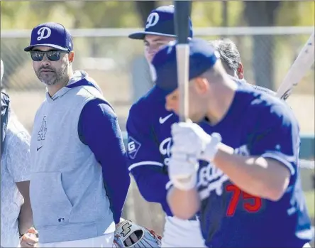  ?? Photograph­s by Robert Gauthier Los Angeles Times ?? ANDRE ETHIER brings his calm demeanor to spring training as he helps the young Dodgers players adjust to the challenges of camp.