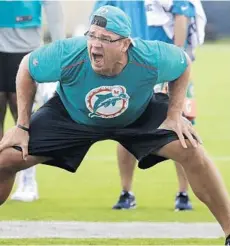  ?? LYNNE SLADKY/AP ?? Dolphins defensive line coach Kris Kocurek is a vocal presence on the practice field and on the sidelines.