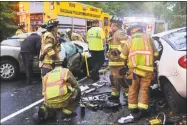  ?? Olivia Drake / Contribute­d photo ?? Haddam Volunteer Co. firefighte­rs worked quickly Thursday night to extricate two victims involved in a motor vehicle accident on Killingwor­th Road/Route 81.