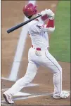  ?? ASHLEY LANDIS — THE ASSOCIATED PRESS ?? The Angels’ Shohei Ohtani watches his first-inning home run Tuesday night. The Angels’ five home runs were the most they have hit in a game in two seasons.