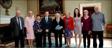  ??  ?? Thomas Martin, 4th left, with President Michael D Higgins, Sabina Higgins and his family members.