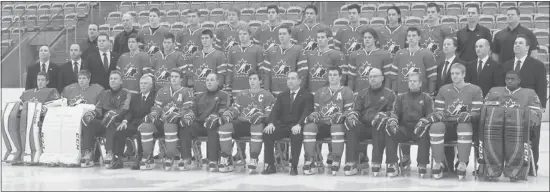  ?? Colleen De Neve/ Calgary Herald ?? The newly named Team Canada Junior Mens team suited up in their uniforms to take the official team photo at WinSport on Friday. Ryan Nugent-Hopkins has been named captain.