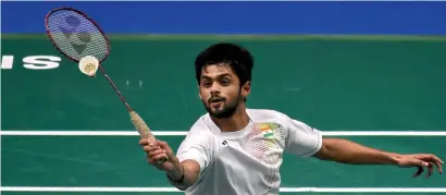  ?? AFP ?? Sai Praneeth of India plays a shot against South Korea’s Lee Dong Keun in their men’s singles semifinal of the Singapore Open. —