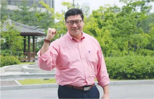  ?? Korea Times photo by Kang Hyun-kyung ?? Jim Paek, director of the national hockey program, gestures at the Seoul Olympic Park in southern Seoul on May 11. He has been compared to Dutch football manager Guus Hiddink after the men’s ice hockey team achieved what the media here called “a...