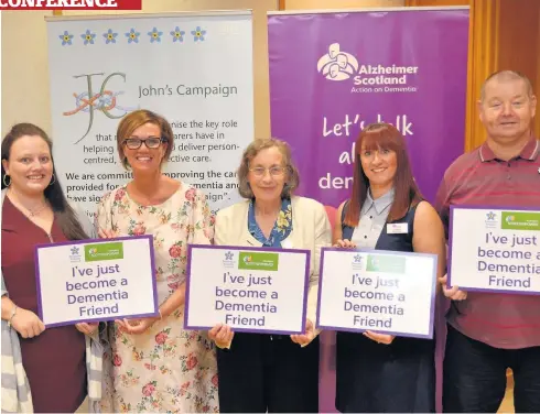  ??  ?? Smiles Stewart, right, with fellow speaker Zaria Sleith, Wishaw General chief of nursing services Gillian McAuley, John’s Campaign co-founder Julia Jones and Alzheimer Scotland representa­tive Lorna Hart