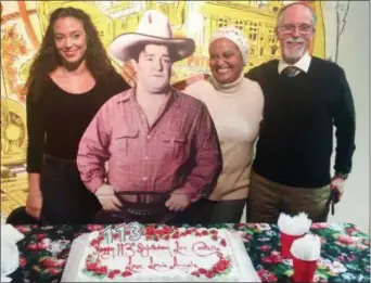  ?? SUBMITTED PHOTO ?? Family members of Paterson native Lou Costello celebrate the 133th anniversar­y of his birth at a recent gathering at the Paterson Museum. Left to right, Maryam Cristillo, a cardboard cutout of her great-grandfathe­r Lou, Aicha Cristillo and her husband Louis Cristillo, grandson of the comedic icon.