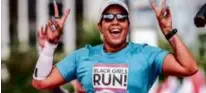  ?? ?? Above, Jay Ell Alexander, owner of Black Girls RUN!, throws up peace signs as she runs the 2023 Chicago Marathon. Below, NaTasha Washington trains for this year’s marathon.