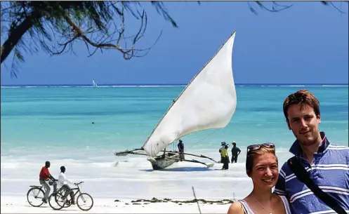  ??  ?? Exotic: A glorious Zanzibar beach and, inset, newlyweds Kate and Charlie