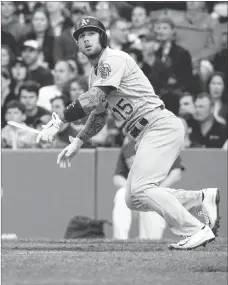  ?? GREGORY J. FISHER/ USA TODAY ?? Athletics third baseman Brett Lawrie breaks his bat in the second inning of Oakland’s 4-2 loss Friday at Boston. A piece of the bat struck a woman in the stands, leaving her with what police called “life-threatenin­g injuries.”