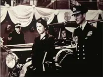  ??  ?? La Reine Elizabeth II et le Prince Philip, lors de la cérémonie de lancement du Britannia le 16 mars 1953 au chantier John Brown & Co, en Ecosse.