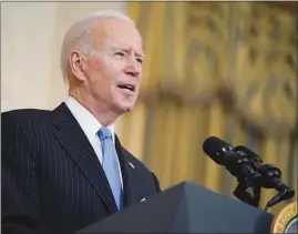  ?? EVAN VUCCI / AP ?? President Joe Biden speaks Tuesday about efforts to combat COVID-19. In remarks delivered in the State Dining Room of the White House, Biden said the United States was “on track to enough vaccine supply for every adult in America by the end of May,” moving up his target to get through a health emergency that has crippled the nation.