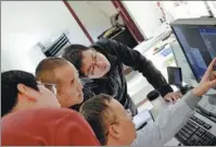  ?? ?? Left: Qi and his team check a snow leopard’s medical check result. Right: Wildlife Park.