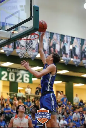  ?? ?? Hooks’ 6-foot-5 forward Landon Hamilton goes up high to lay in an easy basket during the Hornets’ Region II final against Mineola. Hooks won the regional title to earn its first trip to the Class 3A state basketball tournament in San Antonio. (Photo courtesy of Texarkana Gameday)