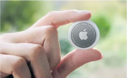  ?? APPLE VIA REUTERS ?? Apple’s AirTags, one of the earliest consumer applicatio­ns of UWB technology, are about the size of four half-dollar coins, stacked.