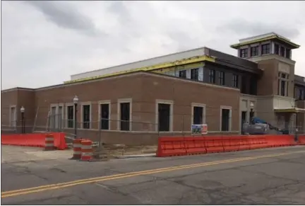  ?? ROYAL OAK TRIBUNE FILE PHOTO ?? Most of the heavy constructi­on on Royal Oak’s new city hall building is completed. All work came to a stop in March because of the COVID-19crisis, but is set to get underway again Thursday.