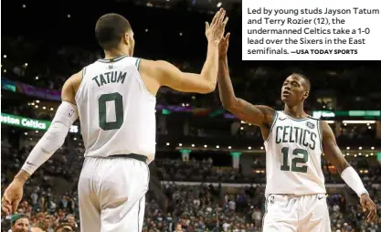 ?? —USA TODAY SPORTS ?? Led by young studs Jayson Tatum and Terry Rozier (12), the undermanne­d Celtics take a 1-0 lead over the Sixers in the East semifinals.