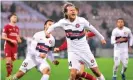  ?? Photograph: Bo Amstrup/EPA ?? Alexander Scholz celebrates scoring a penalty for Midtjyllan­d that earned the hosts a 1-1 draw with Liverpool.