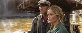  ?? DISNEY+/TNS ?? Dwayne Johnson and Emly Blunt in “Jungle Cruise.”