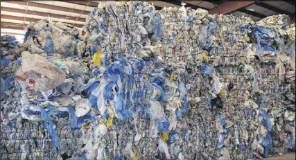  ?? HARRY SULLIVAN/TRURO DAILY NEWS ?? The growing stockpile of plastic products at the Materials Recovery Facility in Kemptown has reached the point where they have run out of indoor storage space.