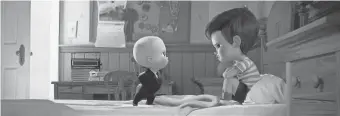  ??  ?? Boss Baby ( Baldwin) and Tim ( Bakshi) have to set aside their sibling rivalry to battle the world’s cutest puppies.