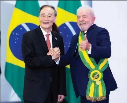  ?? LIU BIN / XINHUA ?? China’s Vice-President Wang Qishan attends the inaugurati­on ceremony of Brazilian President Luiz Inacio Lula da Silva on Jan 1 in Brasilia.