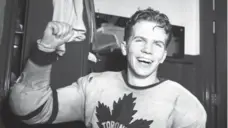  ?? MICHAEL BURNS SR./HOCKEY HALL OF FAME ?? Bill Barilko celebrates in the Maple Leaf Gardens dressing room after his Game 5 OT goal wrapped up the 1951 Stanley Cup for the Leafs.