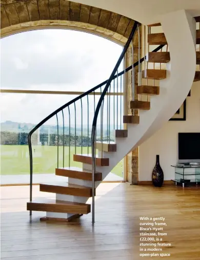  ??  ?? With a gently curving frame, Bisca’s Hyatt staircase, from £22,000, is a stunning feature in a modern open-plan space