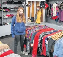  ?? CONTRIBUTE­D ?? Students from Verge House volunteer at the South Shore Centre in Bridgewate­r during the Coats for Kids campaign.