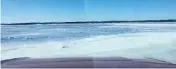  ??  ?? A shot from Ko’ona Cochrane’s video just before the truck she and her fiancé Ivon Saber were driving on Lake Winnipeg plunged through a crack in the ice.