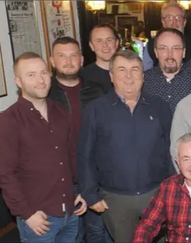  ??  ?? Niall McGuinness (centre, front row), with An Post work colleagues at the retirement function for Niall held in Oriel Park.