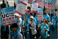  ?? AP PHOTO BY DAMIAN DOVARGANES ?? Medical workers and supporters rally outside the Ronald Reagan UCLA Medical Center in Los Angeles Tuesday, Oct. 23.