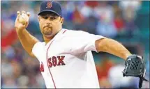  ?? Elise Amendola Associated Press ?? KNUCKLEBAL­LER Tim Wakefield was the the starter for Boston in Game 1 of the 2004 World Series against St. Louis.