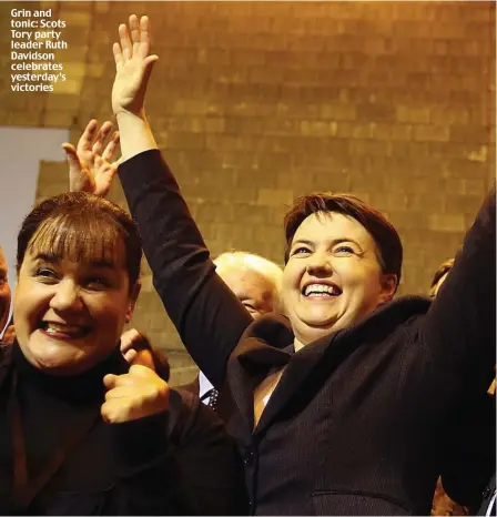  ??  ?? Grin and tonic: Scots Tory party leader Ruth Davidson celebrates yesterday’s victories