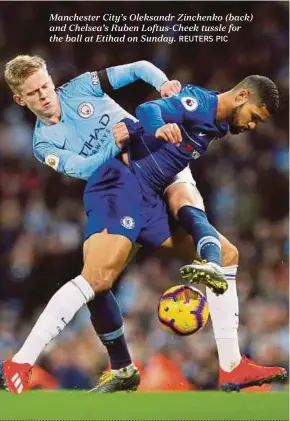  ?? REUTERS PIC ?? Manchester City’s Oleksandr Zinchenko (back) and Chelsea’s Ruben Loftus-Cheek tussle for the ball at Etihad on Sunday.