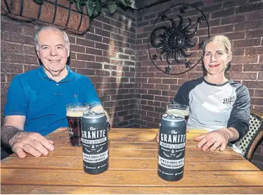  ?? ANDREW FRANCIS WALLACE TORONTO STAR ?? Ron Keefe and his daughter, Mary Beth, pose at the Granite Brewery. Torontonia­ns hoping to grab a drink and a bite on their favourite patio or getting their hair cut will have to wait a while. “Very, very soon,” says Premier Doug Ford.