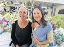  ?? Picture: SIPOKAZI FOKAZI ?? WOMEN’S RIGHTS: Emma Graham holds her daughter, Isla, with Susan Lees, a midwife who was one of the women who attended the launch of a pro-natural Right to Birth movement. Obstetrici­ans are increasing­ly pushing for C-sections because they say if anything goes wrong, it is they who are held liable, not midwives.