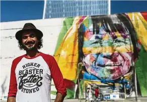  ?? — EPA ?? ‘ the street was my way to socialise, have fun and also protest against social exclusion,’ says Kobra, posing in front of a mural he painted in rio de Janeiro.