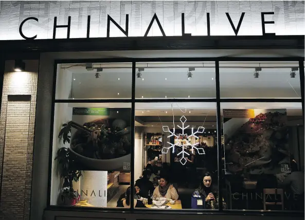  ?? — PHOTOS: THE ASSOCIATED PRESS ?? People dine in the Oolong Cafe at China Live, a culinary and cultural landmark in San Francisco’s Chinatown.