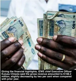  ??  ?? Giving the financial highlights, IZWE chief Executive Officer Kulusu Chisola said the gross revenue amounted to K168.2 million, slightly decreasing by two per cent when compared with prior year.