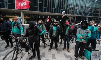  ??  ?? ‘There is mounting concern here about job losses after furlough ends, the rise of the online giants, and disputes in the gig economy.’ Striking Deliveroo riders, London, 6 April. Photograph: Guy Smallman/Getty Images