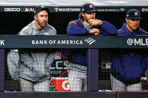  ?? Brett Coomer / Staff photograph­er ?? A lawsuit filed by former Angels clubhouse attendant Brian “Bubba” Harkins against the Angels and Major League Baseball alleges he provided Astros ace Justin Verlander, left, and former Astro Gerrit Cole various sticky substances to help with their pitching grips.