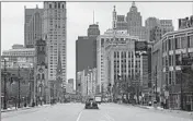  ?? PAUL SANCYA/AP ?? With the pandemic forcing many offices to close, those who remain in Detroit wonder if revitaliza­tion will return.